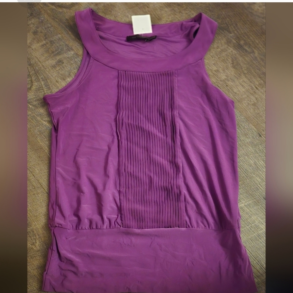 The limited women’s purple blouse XS